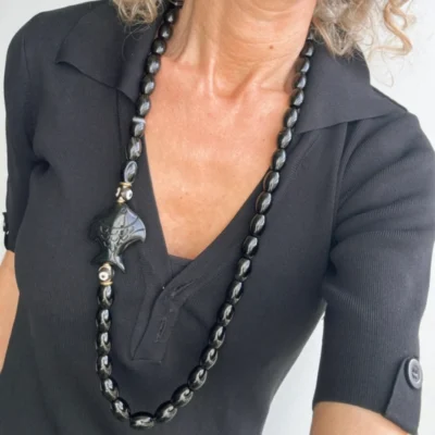 fish necklaces, black or white