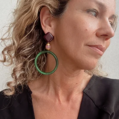 green eye earrings