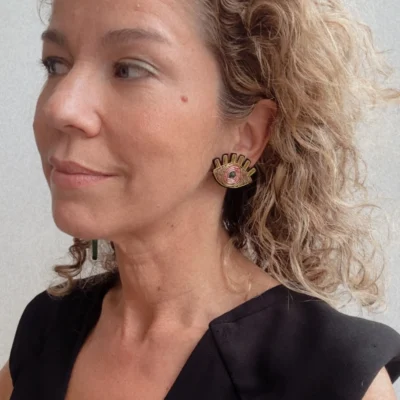 green eye earrings